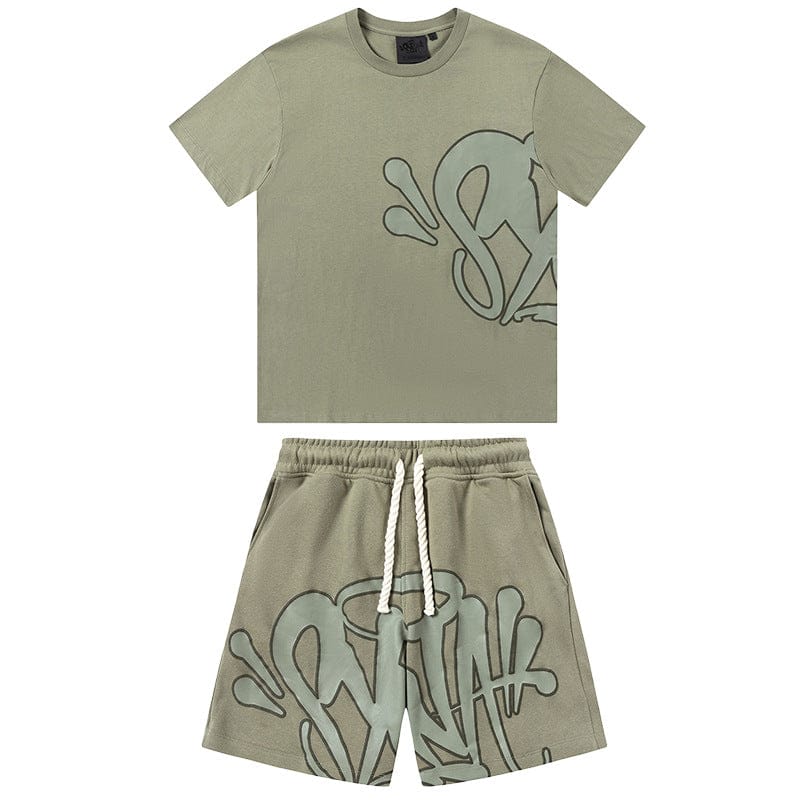 Olive green Syna World T-Shirt and Shorts Set with large graffiti-style SW lettering and splash graphics—a standout streetwear outfit. Available in 8 colors and comes with accessories.