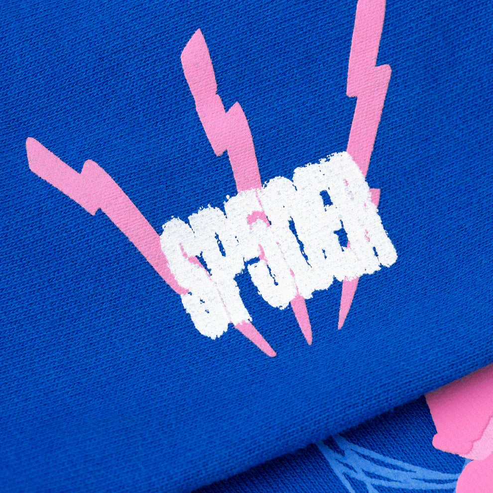 The Sp5der “555” Hoodie is a royal blue 440GSM heavyweight pullover featuring bold white “SPENCER” lettering over four pink lightning bolts in a streetwear spider web design.
