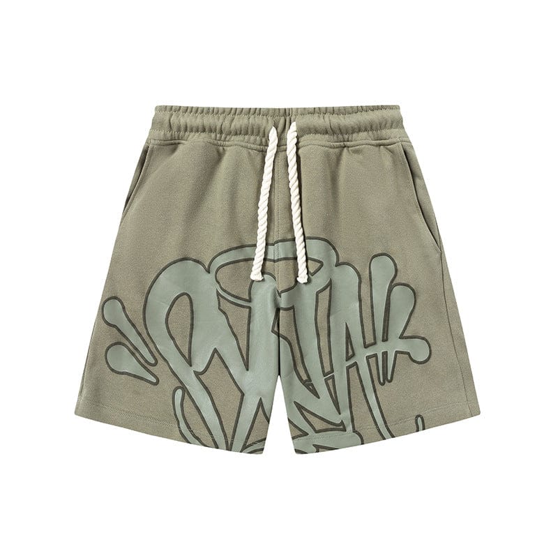 The Syna World Graphic Shorts—streetwear drawstring shorts in olive green with a white cord and bold graffiti-style graphic, shown on a plain background. Available in 8 colors.